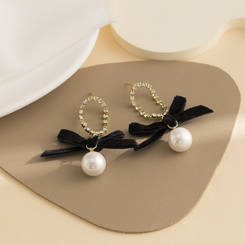 Black bow pearl long earrings, fashionable and elegant, light luxury mosquito coil ear clip